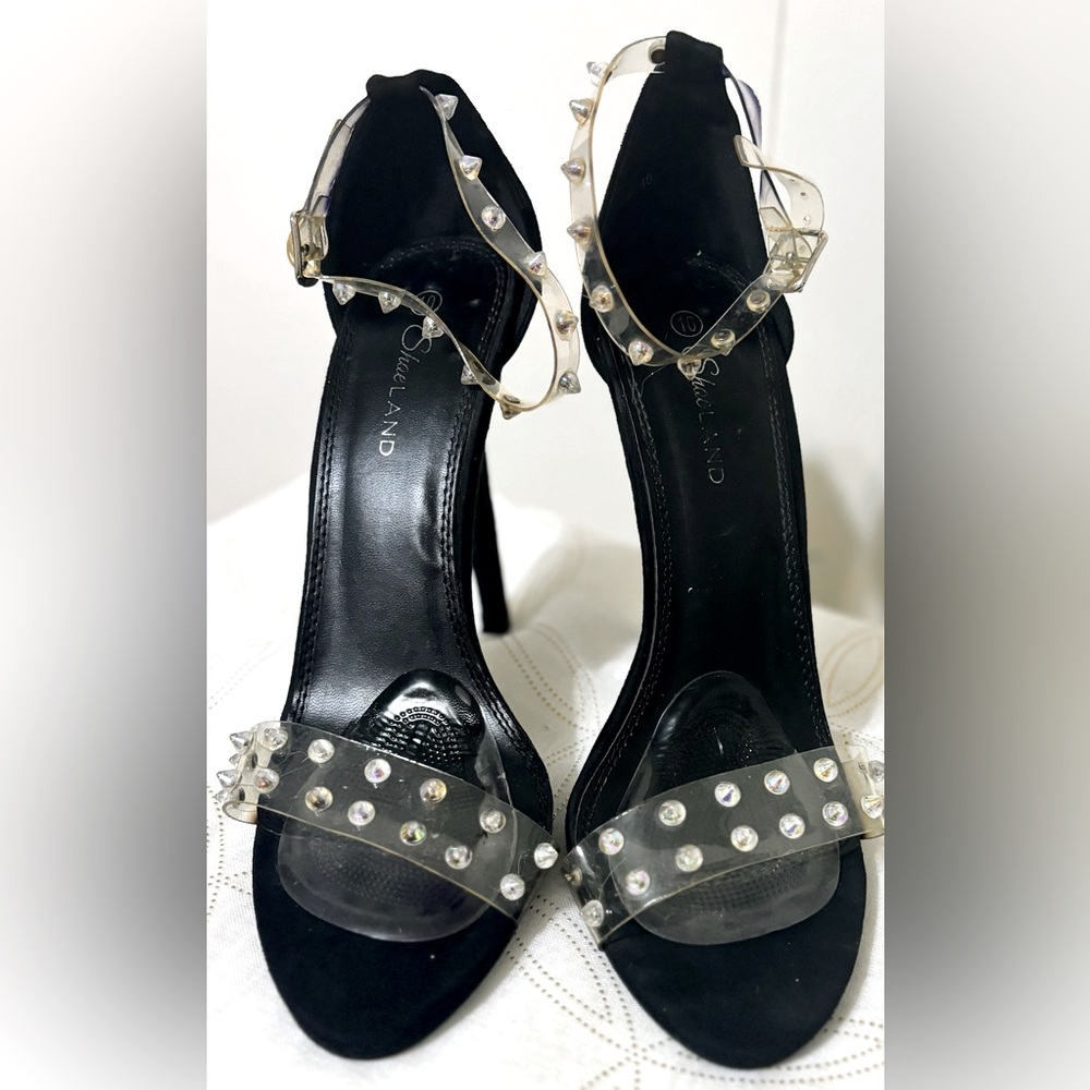Transparent and black heel